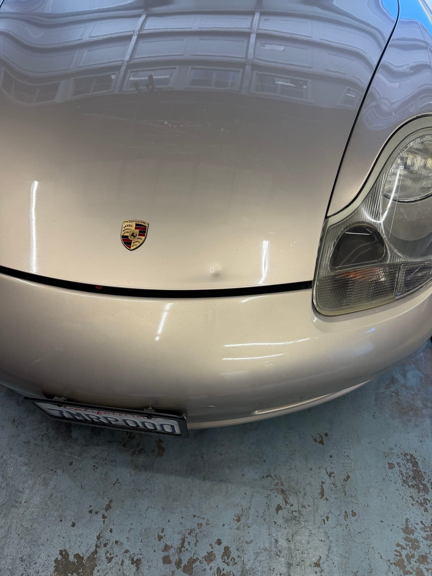 Before: Hood Dent on Sedan