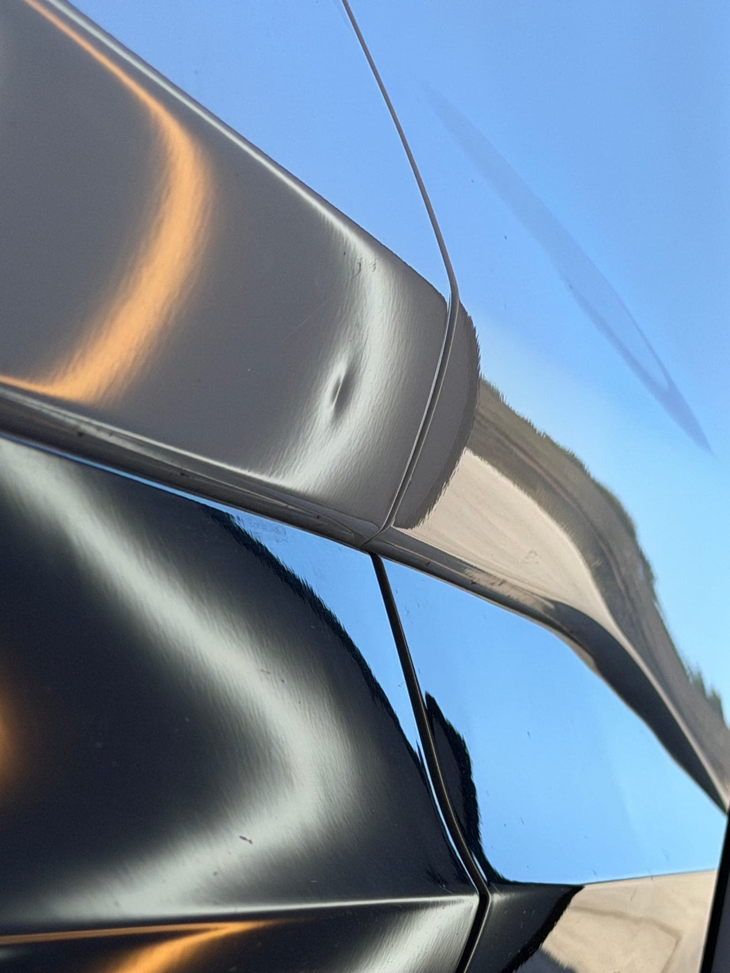 Before: Panel Ding on Sedan