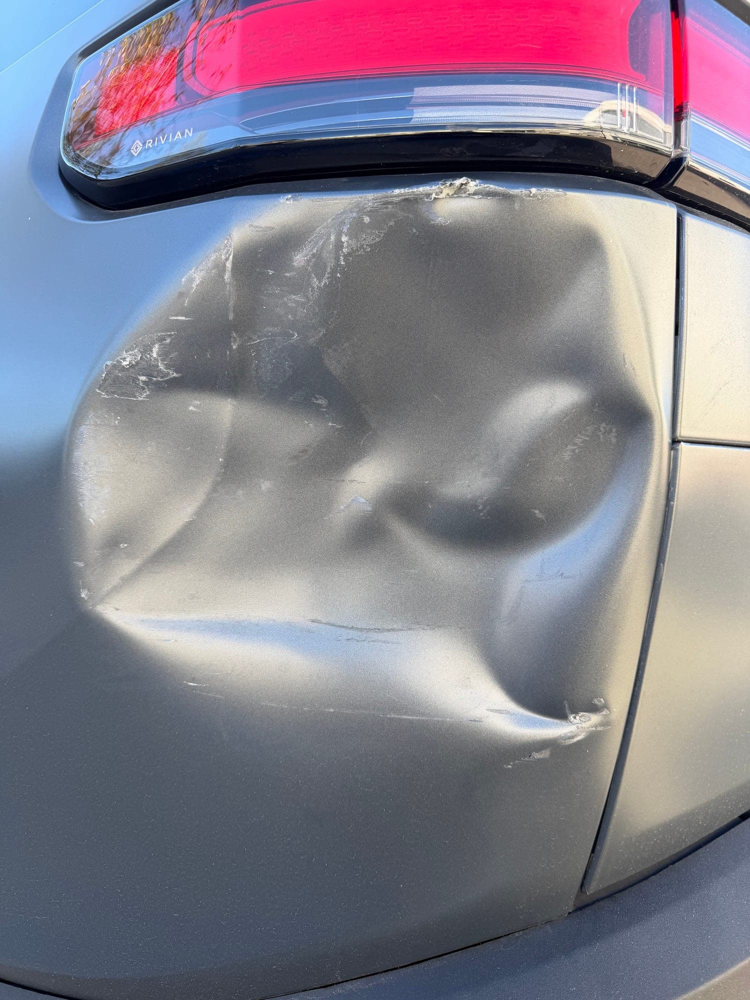 Before: Panel Damage on Rivian