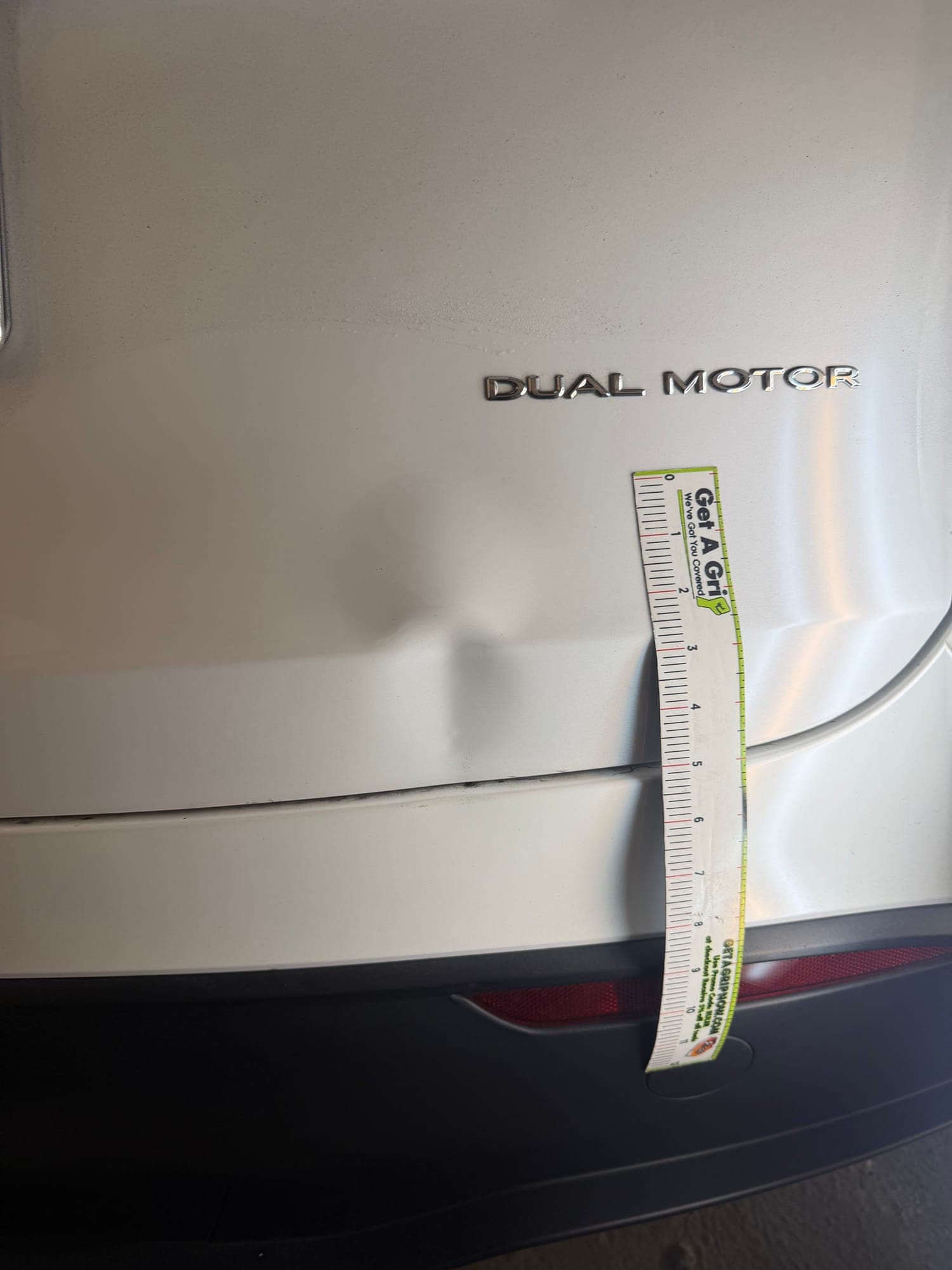 Before: Body Line Crease on Tesla