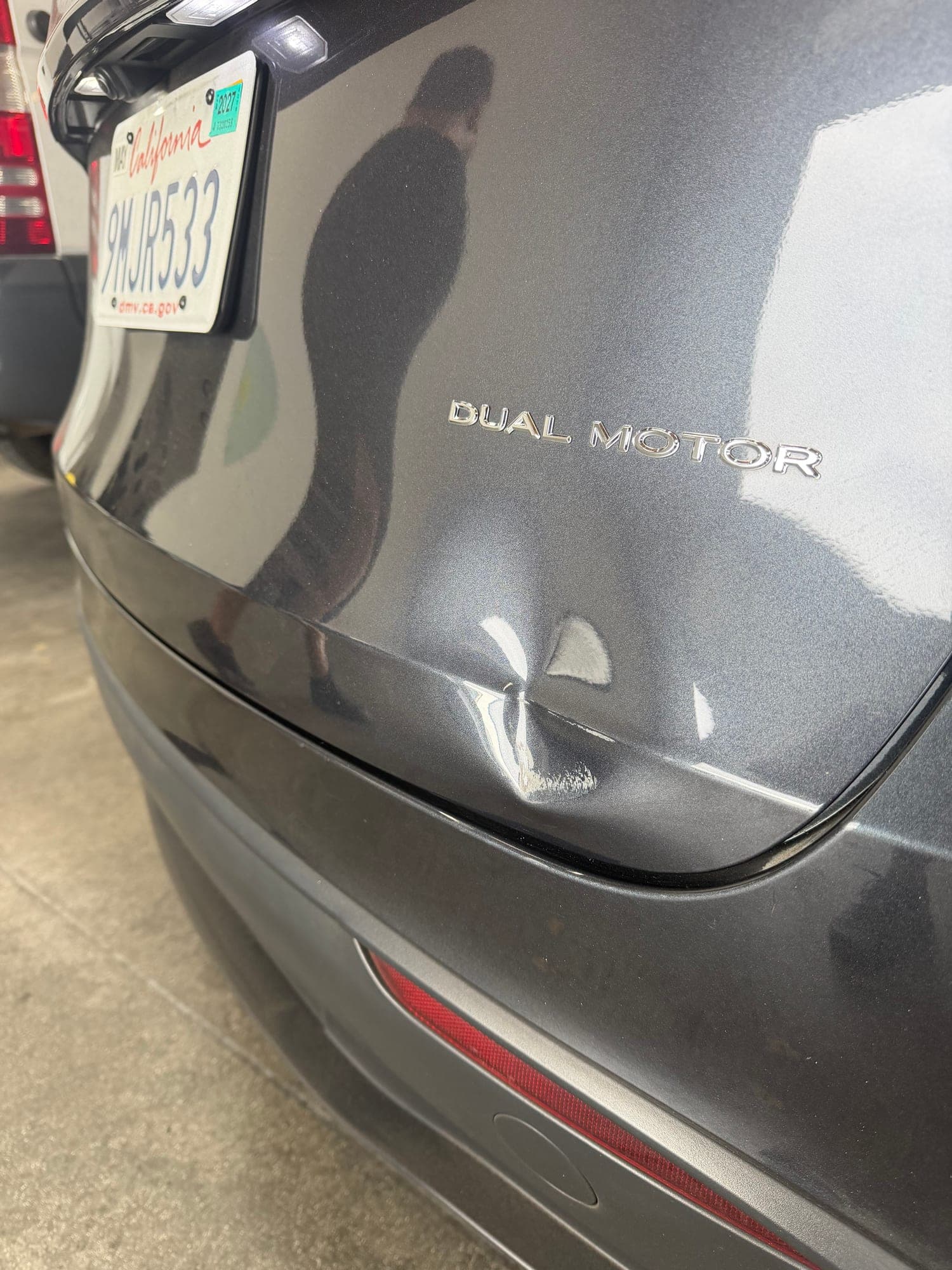 Before: Trunk Dent on SUV